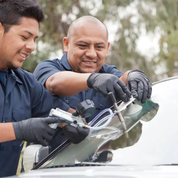 Auto glass repair in Covington GA technician working