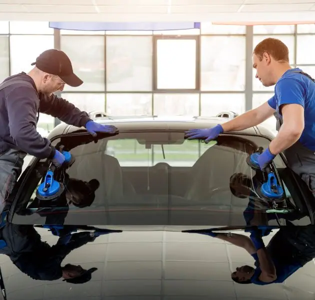 repair man working windshield replacement marietta ga